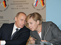 Vladimir Putin und Angela Merkel 2006 in Tomsk (Photo: https://commons.wikimedia.org/wiki/File:Putin_merkel.jpg).