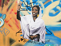 [Translate to English:] Street-Art-Foto der sudanesischen Studentin und Demonstrantin Alaa Salah