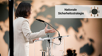 Bundesaussenministerin Annalena Baerbock im Portrait bei ihrer Rede mit Weltkarte im Hintergrund bei der Veranstaltung Auf dem Weg zu einer Nationalen Sicherheitsstrategie im Auswaertigen Amt in Berlin